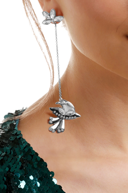 Silver earrings on a long chain fledgeling